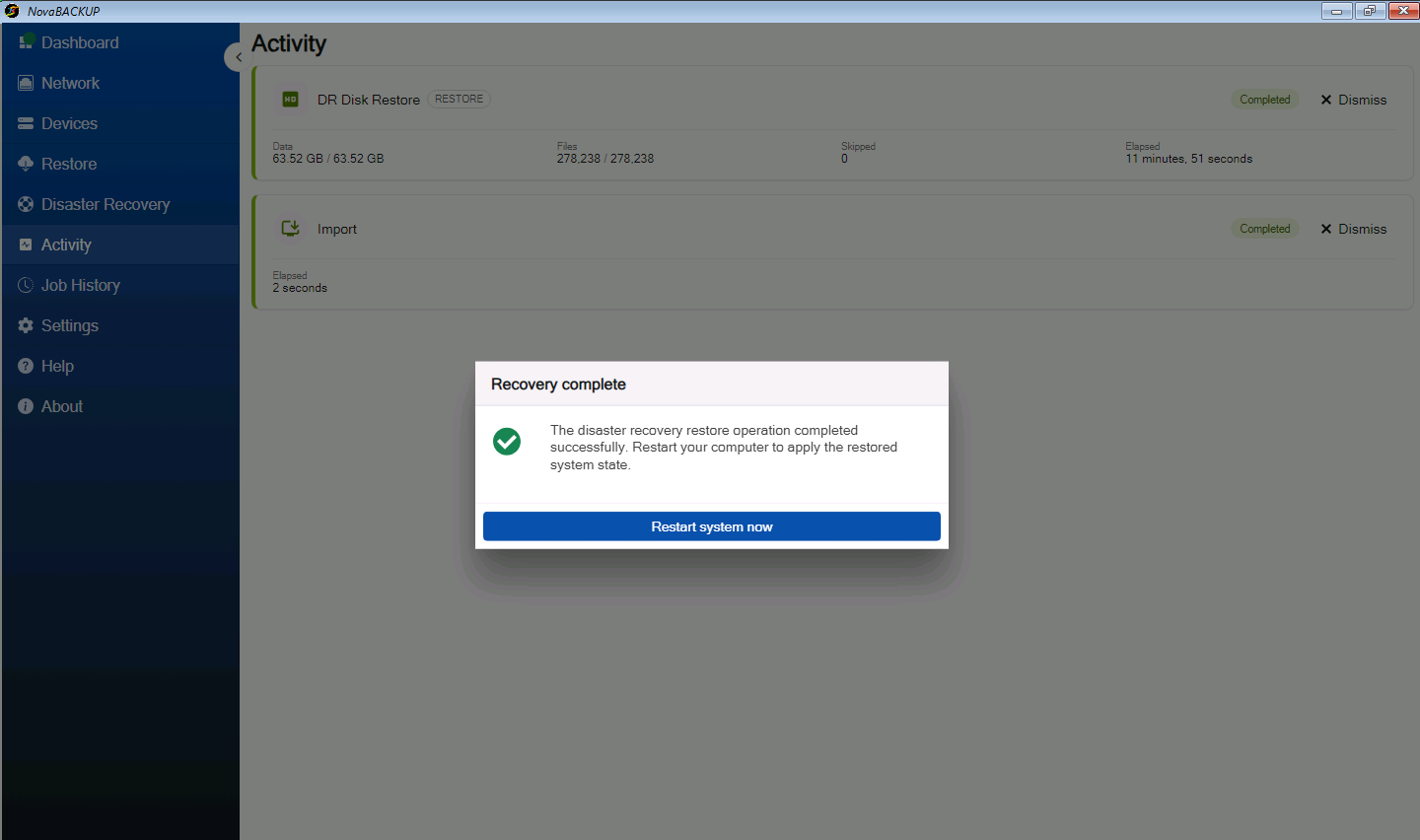 Recovery complete dialog with the Restart system now button